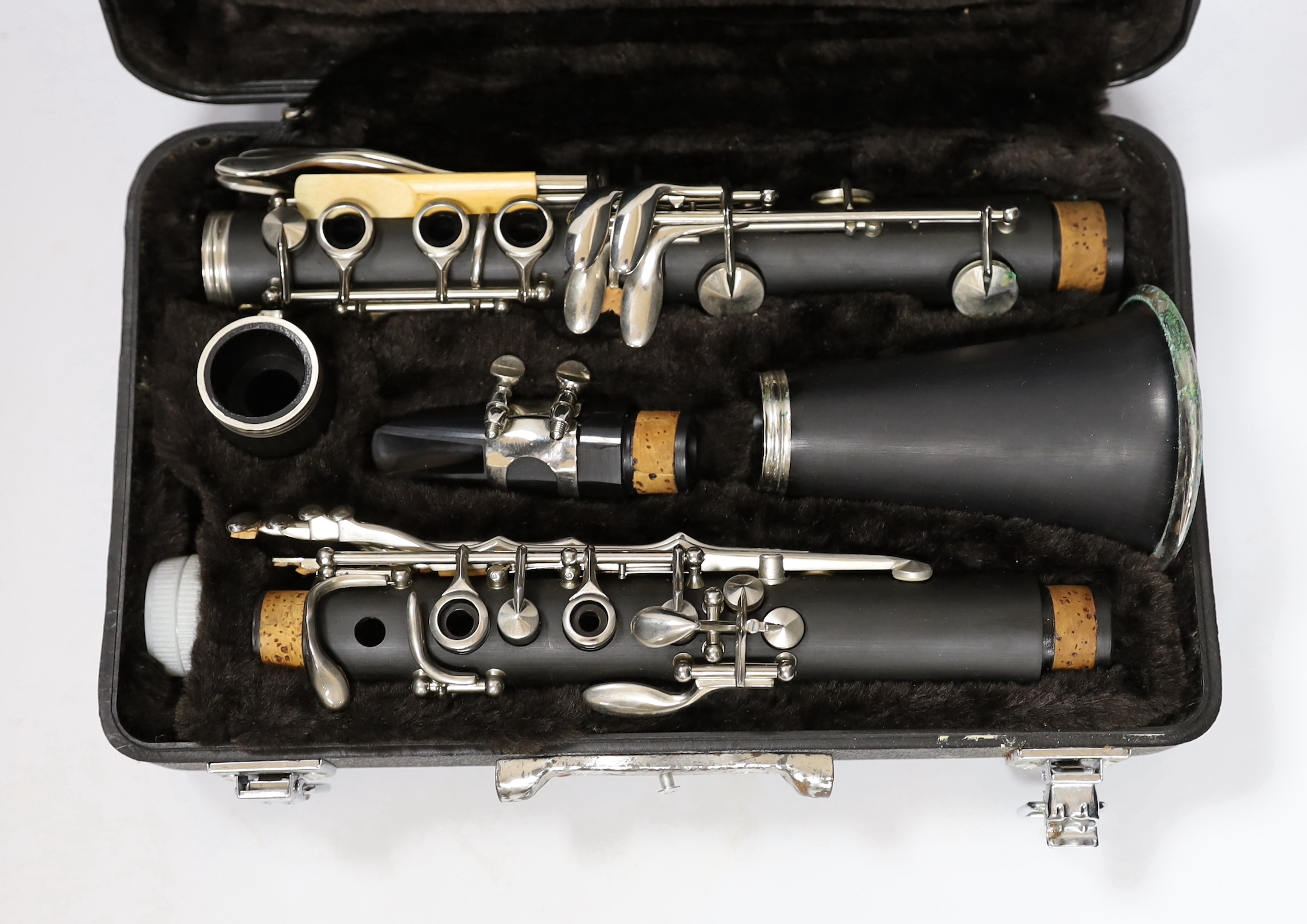 A cased Lindo clarinet